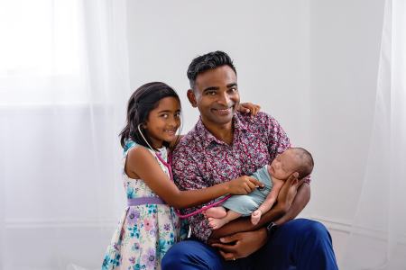 Photo of Dr Jubal John with his children